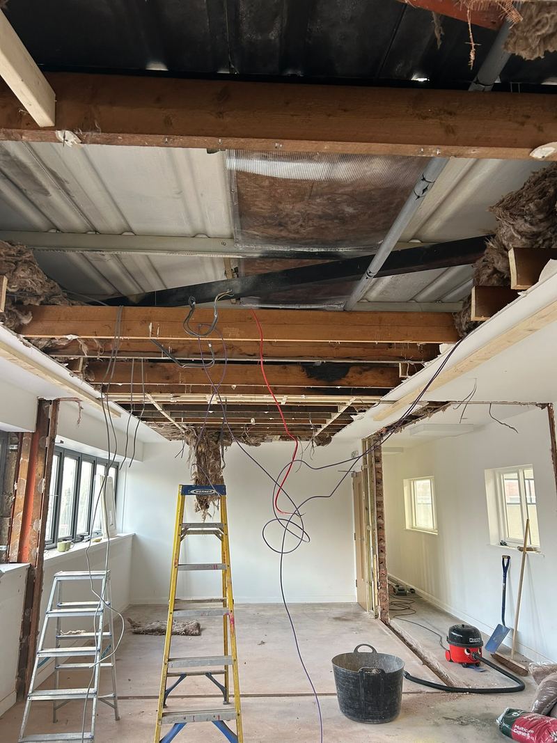 The old ceiling opened up to the structure above